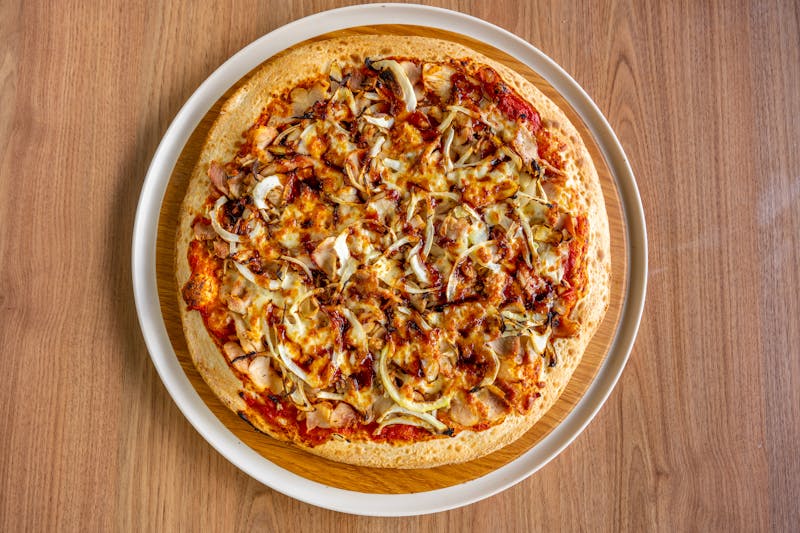 BBQ chicken pizza with red onion