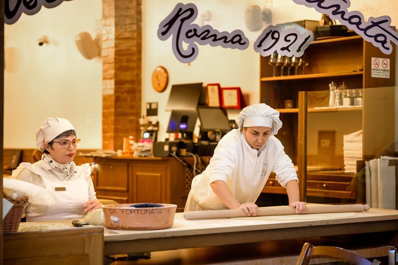 Interior of Seasons Pizza restaurant with warm lighting and welcoming atmosphere
